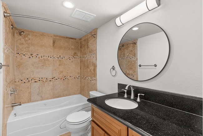 Step into luxury with this modern bathroom, designed for relaxation and style. - Vista Terrace Apartments