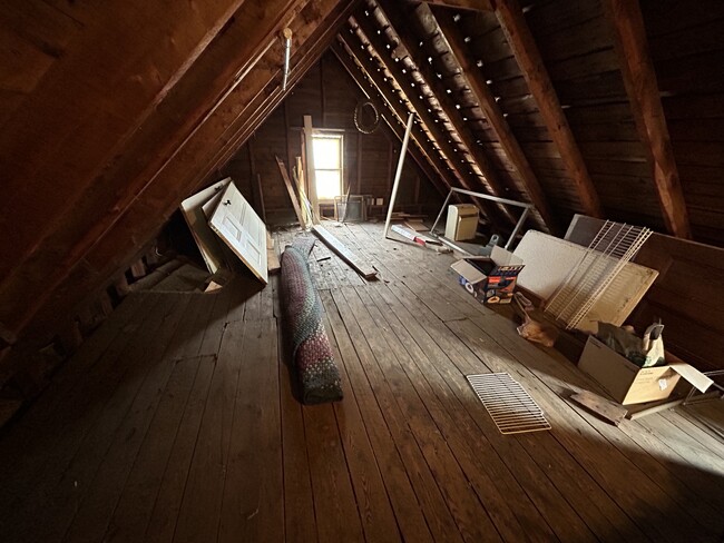 The attic. Can be cleared at tenant’s request. - 23 Pleasant St