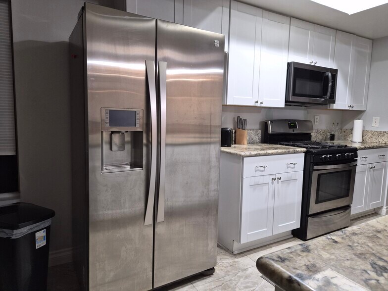 Building Photo - 4581 Warner Ave