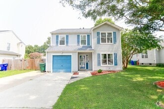 Building Photo - Modern Comfort in a Peaceful Setting – 4BR...