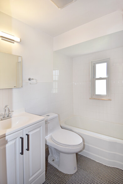 Stylish mosaic penny tile flooring in bathroom - 31 Marylea Ave