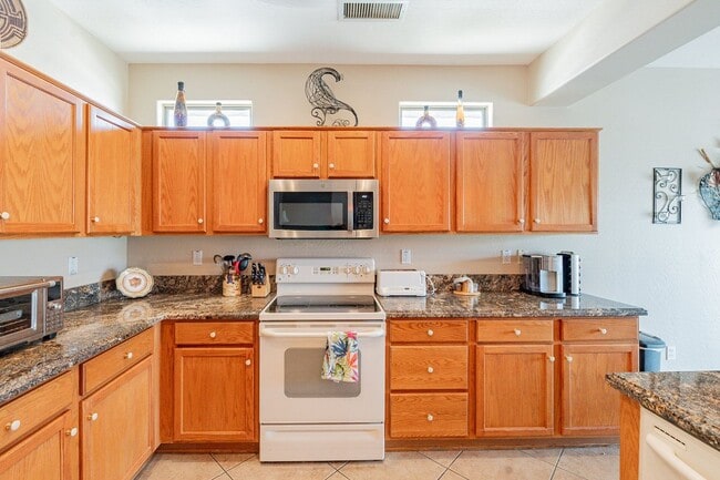 Building Photo - STUNNING Home with New AC in Exclusive 'Th...