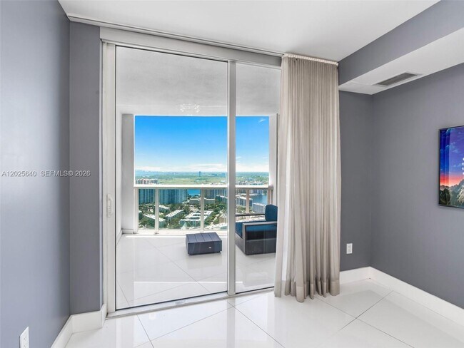 Building Photo - 18201 Collins Ave