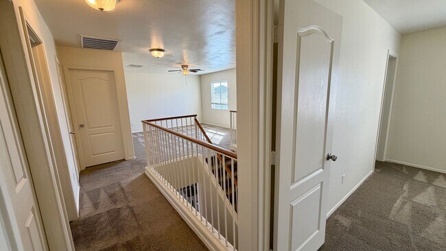 Building Photo - Two Story Home with NEW tile and a large backyard!