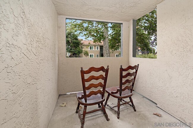 Building Photo - 7455 Charmant Dr