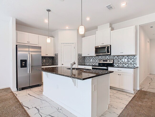 Building Photo - JUST REDUCED! PET FRIENDLY! Experience Com...