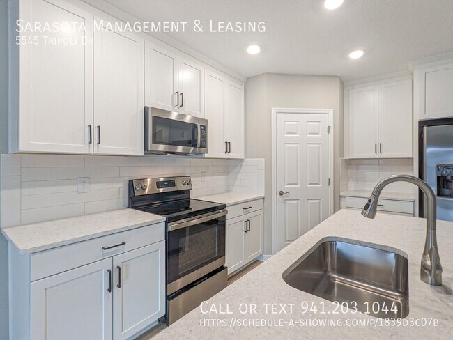 Building Photo - 5545 Tripoli Dr