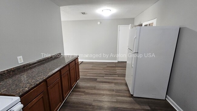 Building Photo - 7384 Irving Scott Dr