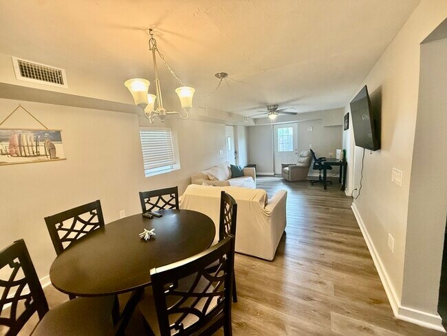 Building Photo - Charming Coastal Cottage with Huge Fenced Yard & Smart Tech!