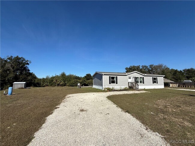 Building Photo - 5469 W Grovepark Rd