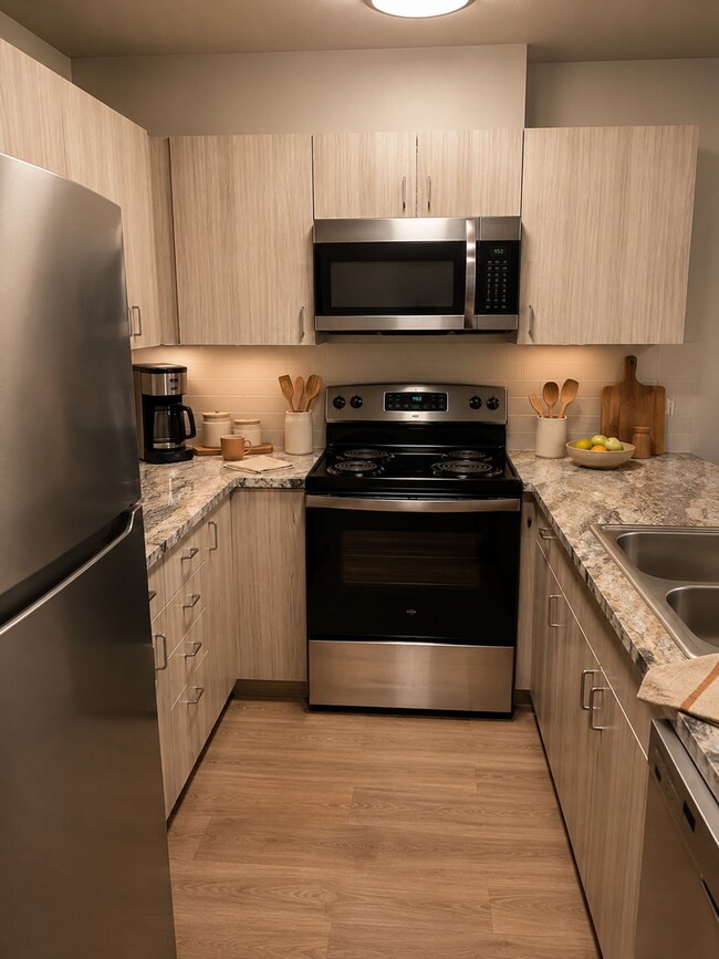 Building Photo - Open Layouts and Modern Finishes Await! From Stainless Steel Style To LVP Floors You'll Love!