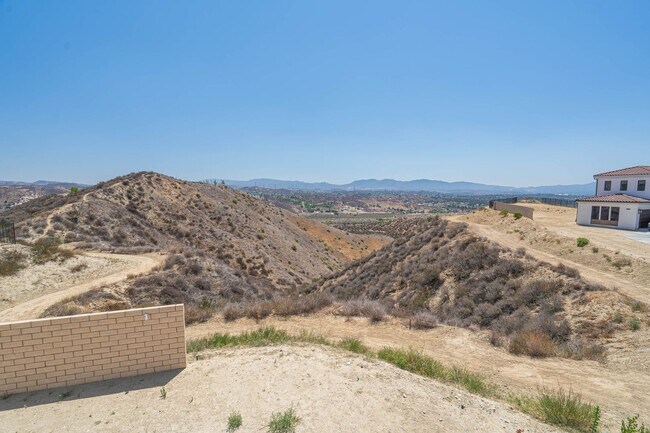 Building Photo - Spacious 5-Bedroom Home with Community Ame...