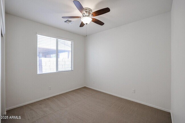 Building Photo - 10398 W Rosewood Ln