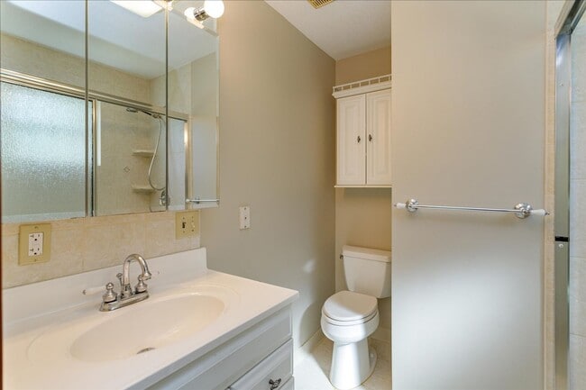 Building Photo - Run don't walk for this one of a kind beautifully maintained Old Florida Charmer on a park like d...