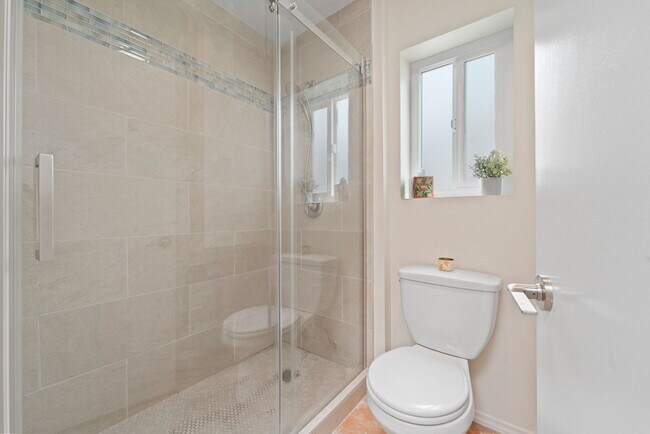 New tiled shower - 709 Agate St