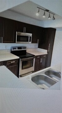 Building Photo - 10441 SW 155th Ct