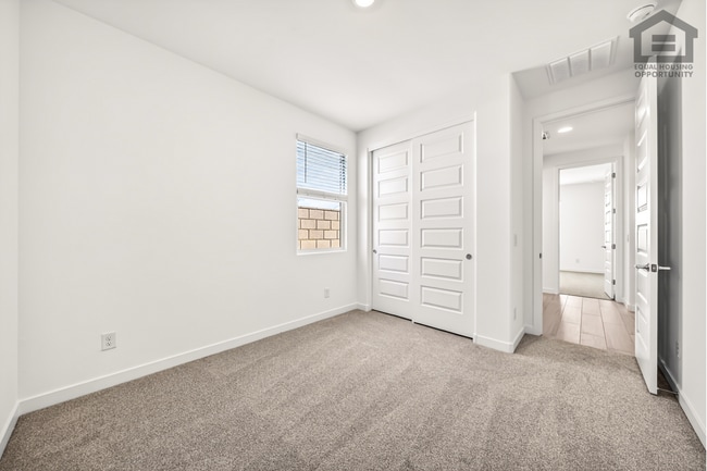 Building Photo - 4Bed/3Bath House at Thomas Rd/99th Ave! Ready for Immediate Move-In! -- Mother-In-Law Suite W/Pri...