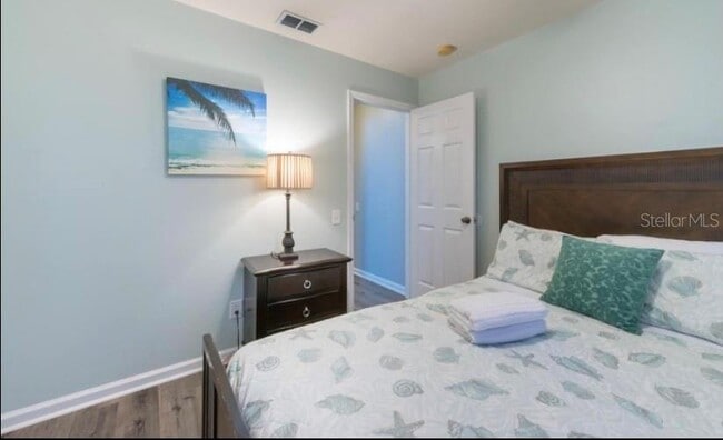 Building Photo - 8121 Fan Palm Way