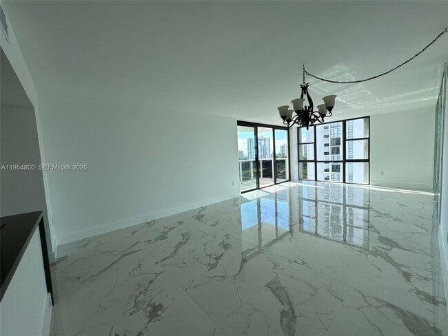 Building Photo - 3675 N Country Club Dr