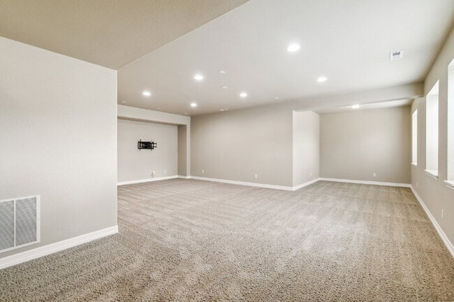 Building Photo - Stylish Cordera Ranch with Finished Basement, Gourmet Kitchen, and Ideal D20 Location