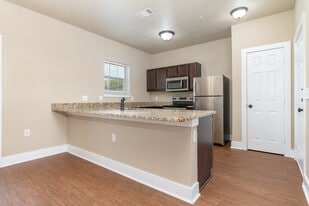Building Photo - The Woodlands of Denton