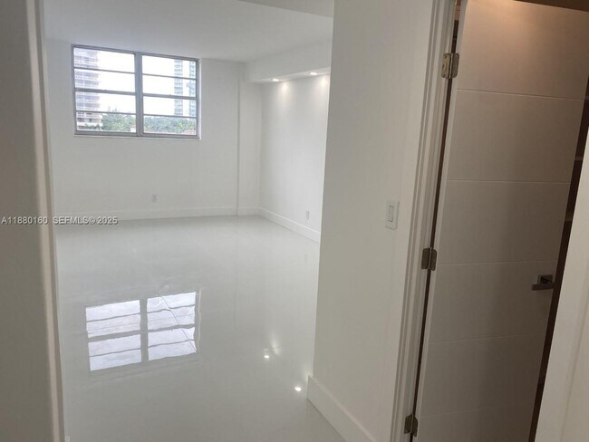 Building Photo - 19390 Collins Ave