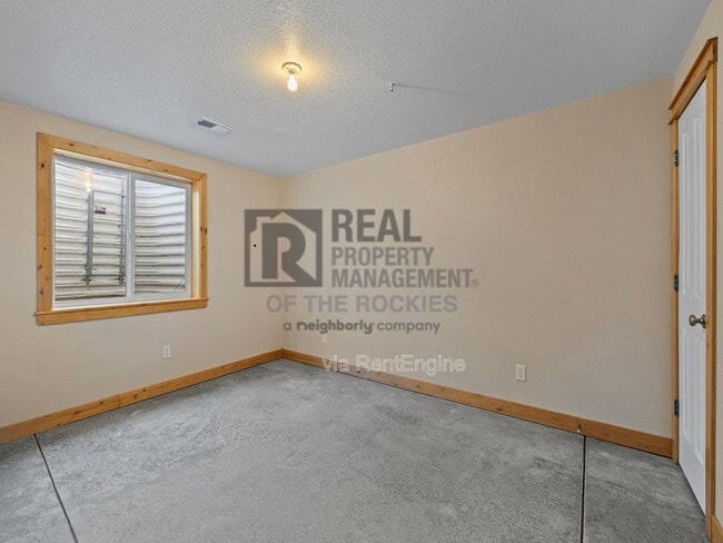 Building Photo - 8924 Smoke Signal Way