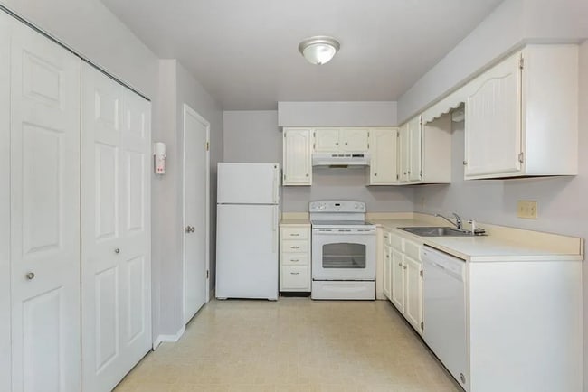 Building Photo - This charming house offers a cozy and comfortable living space.