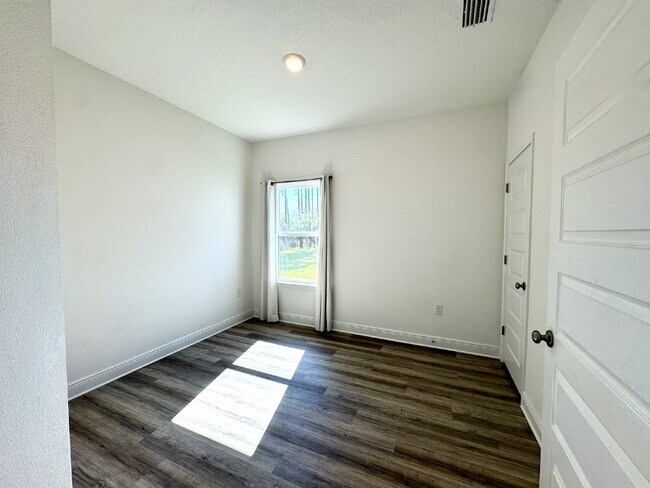 Building Photo - This gorgeous new construction home in Ward Creek overlooks a protected nature preserve.