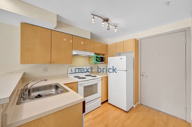 Building Photo - Modern Studio with Sleeping Alcove & Incre...