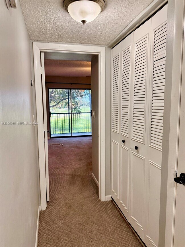 Building Photo - 200 Jacaranda Country Club Dr
