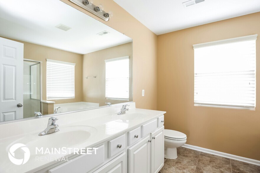 Building Photo - 6826 Championship Dr