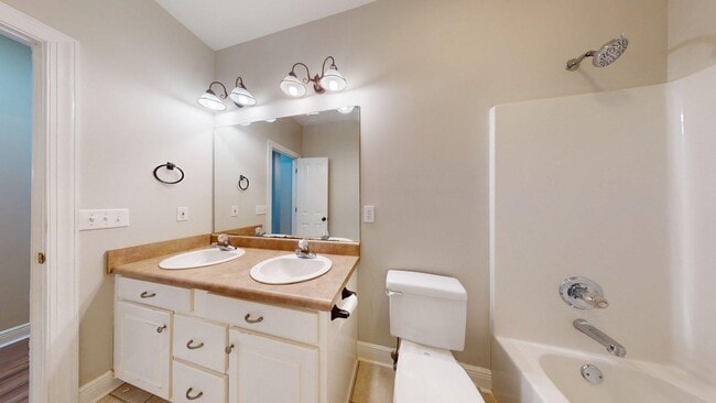 Building Photo - One Level 4 Bedroom Brick Home on N. Colle...