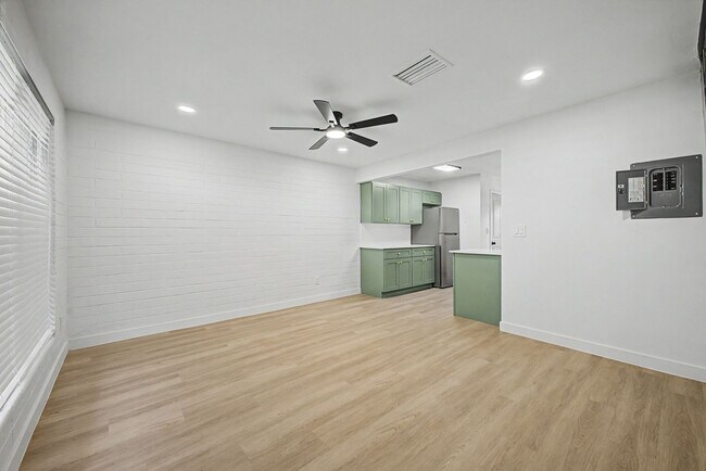 Building Photo - Spacious 2 Bed + Bonus Room | Large Private Yards | Covered Parking | 8 Weeks Free Rent!