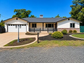 Building Photo - Private 3BR Home on Approx. 1 Acre | Huge Fenced Yard, Sunroom & 2-Car Garage