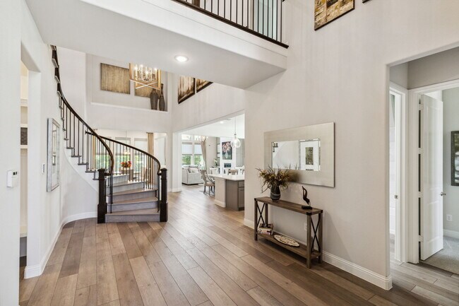 Grand entry with view into the kitchen and living room, Office is to the right - 2871 Cannon Dr