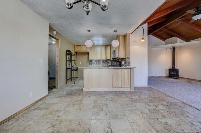 Building Photo - 1/2 acre in the with RV Hook ups