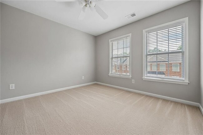 Building Photo - 4721 Creekside Villas Way