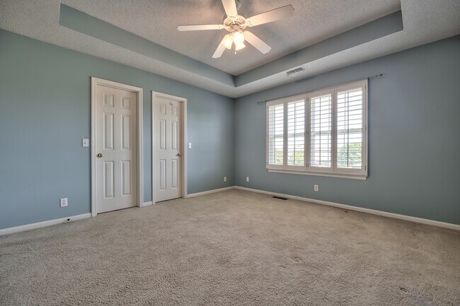 main bedroom with 2 closets - 22613 W 72nd Ter