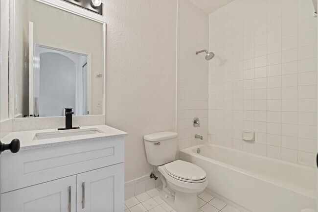 Building Photo - 2-bath condo on the 2nd floor with a newly...