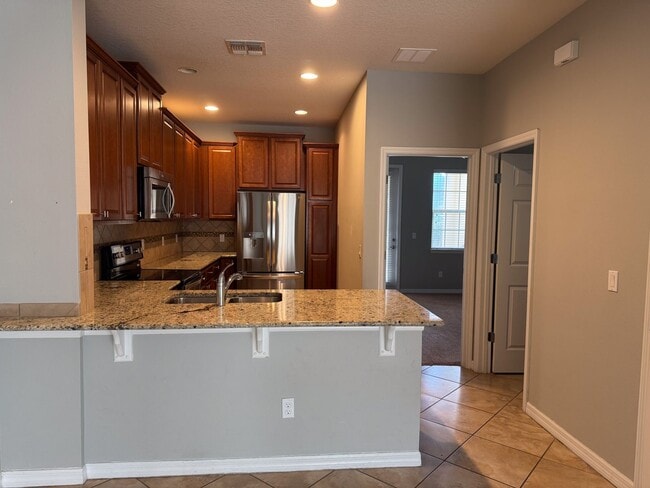 Building Photo - Lake Nona 3 Bedroom 3 Bath Townhouse in Vi...