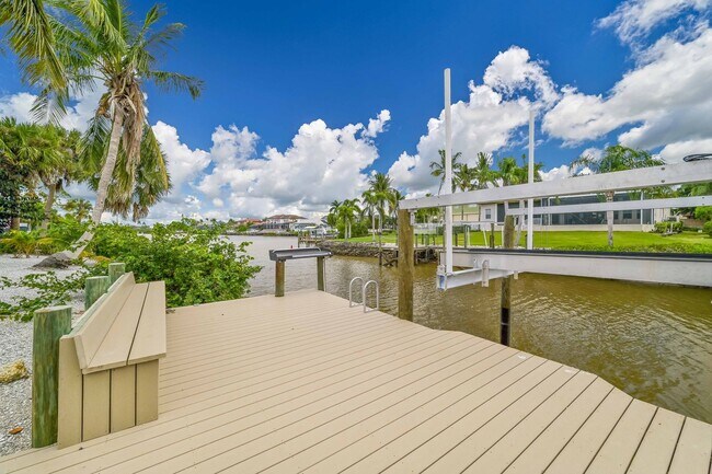 Building Photo - **Direct Gulf Access Pool Home! 4 BED/3 BA...