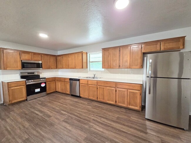 Building Photo - NEW IN MANAGEMENT - AVAILABLE NOW!