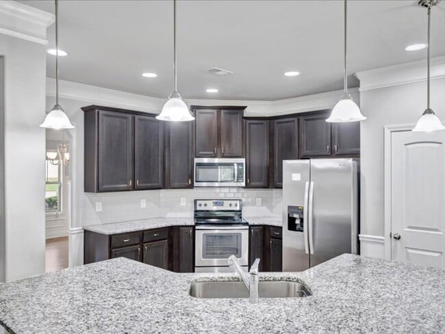 Building Photo - Spacious 4BR Home with Fenced Yard & Community Pool