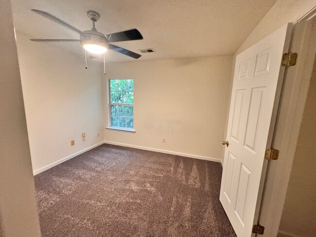 Building Photo - Peaceful 2-Story Townhome - Soothing sound...