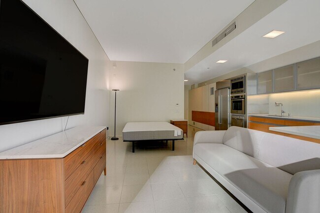 Building Photo - Stunning Strip Views from this Fully Furnished Studio Residence.