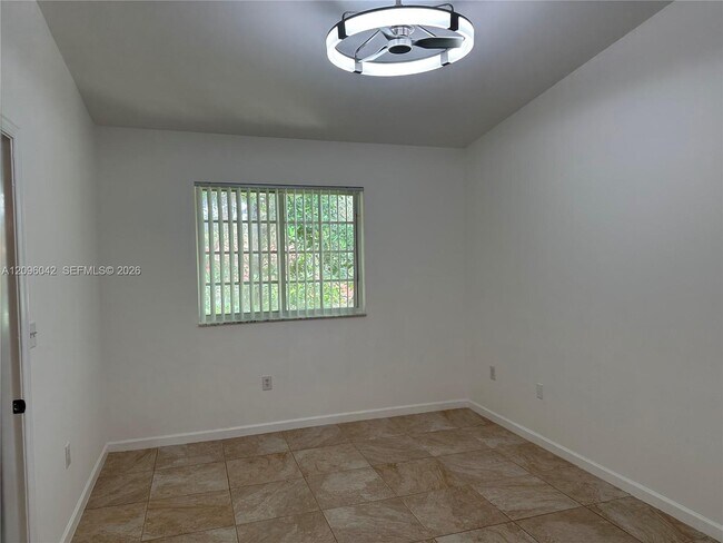 Building Photo - 3241 Sabal Palm Manor