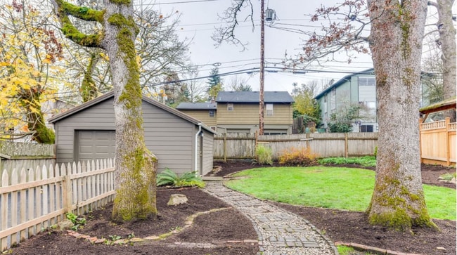 Building Photo - Charming 2 Bedroom 1 Bathroom Bungalow with Oversized 1 Car Garage and Large Manicured  Backyard ...