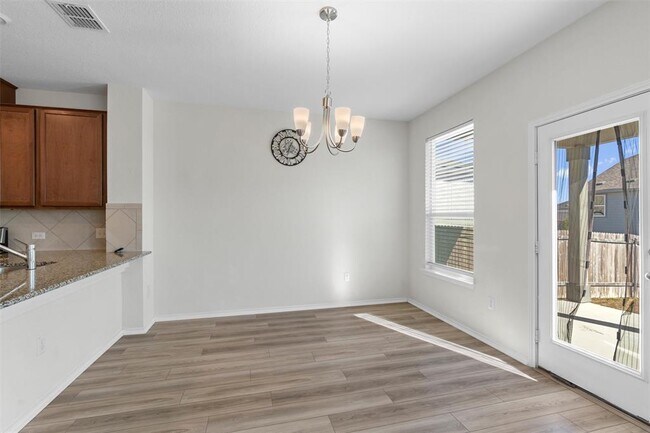 Building Photo - 7705 Song Sparrow Dr.