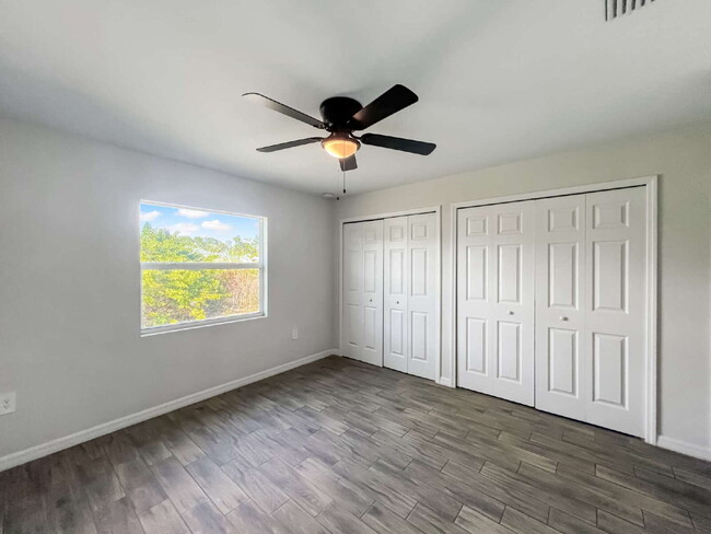 Building Photo - Move-In Special! Half Month FREE – APPLY by November 30th – Modern 3BR/2BA Duplex in Lehigh Acres...